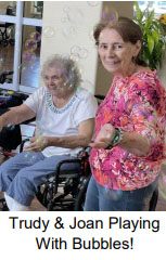 trudy and joan playing with bubbles Trudy and Joan playing with