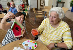 memory care resident Rose with her friend